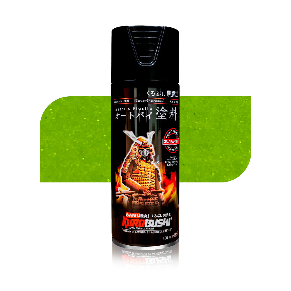 Spray paint can with colorful artwork and green-toned label, black cap